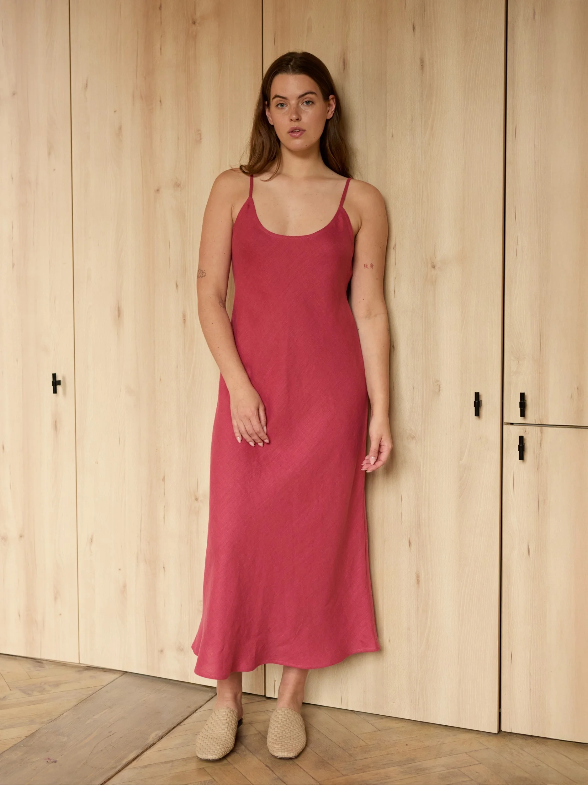 Image 2 of DIORA bias-cut linen slip dress with spaghetti straps and midi length, elegant evening wear from Love and Confuse | Raspberry Color