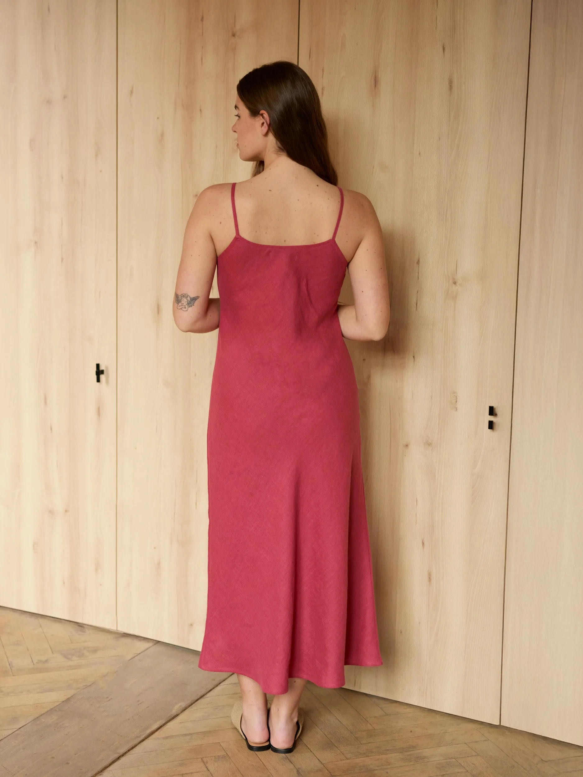 Image 6 of DIORA bias-cut linen slip dress with spaghetti straps and midi length, elegant evening wear from Love and Confuse | Raspberry Color