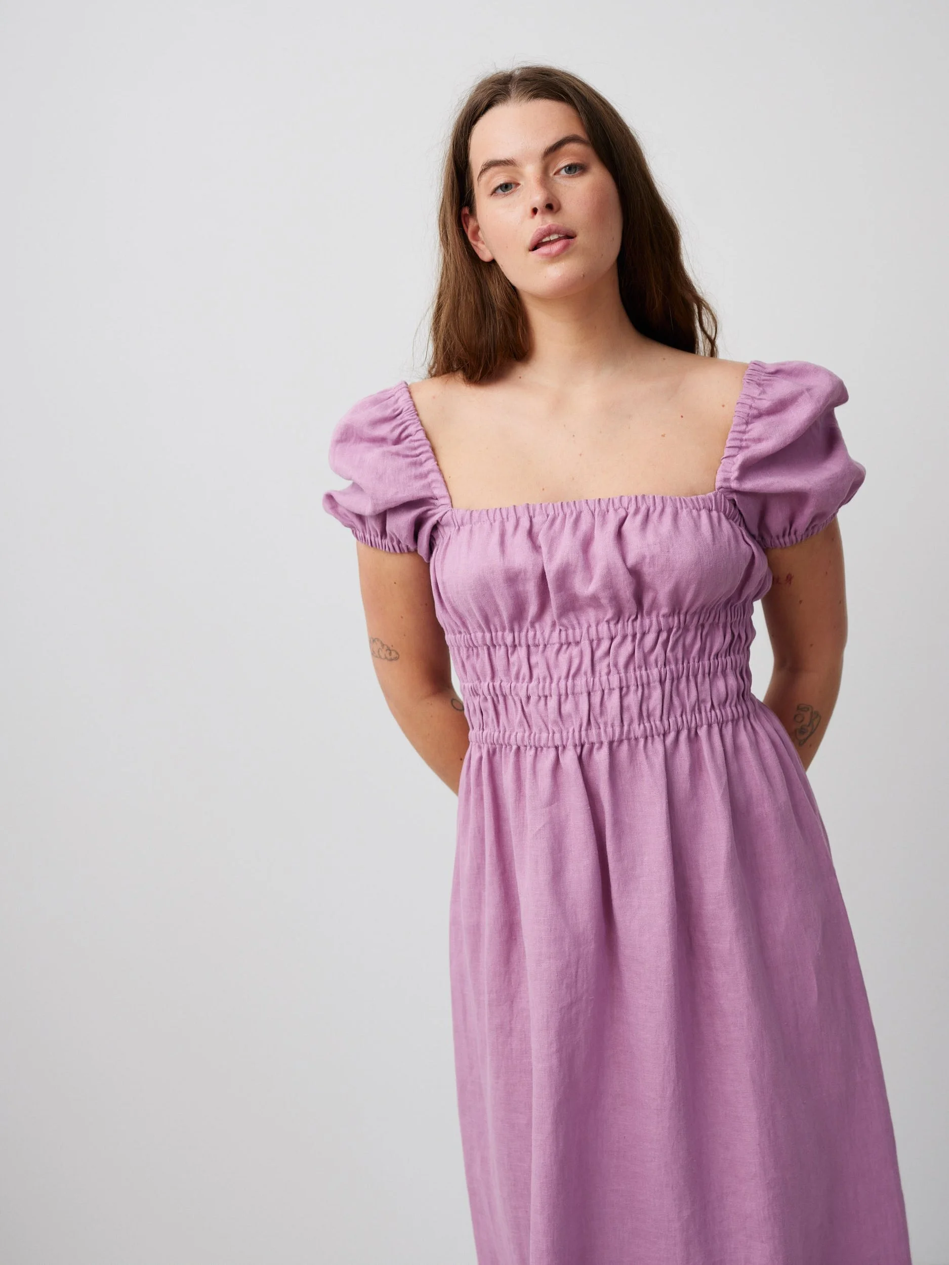 Image 1 of HOLIDAY Puff Sleeve Linen Dress in Radiant Orchid from Love and Confuse