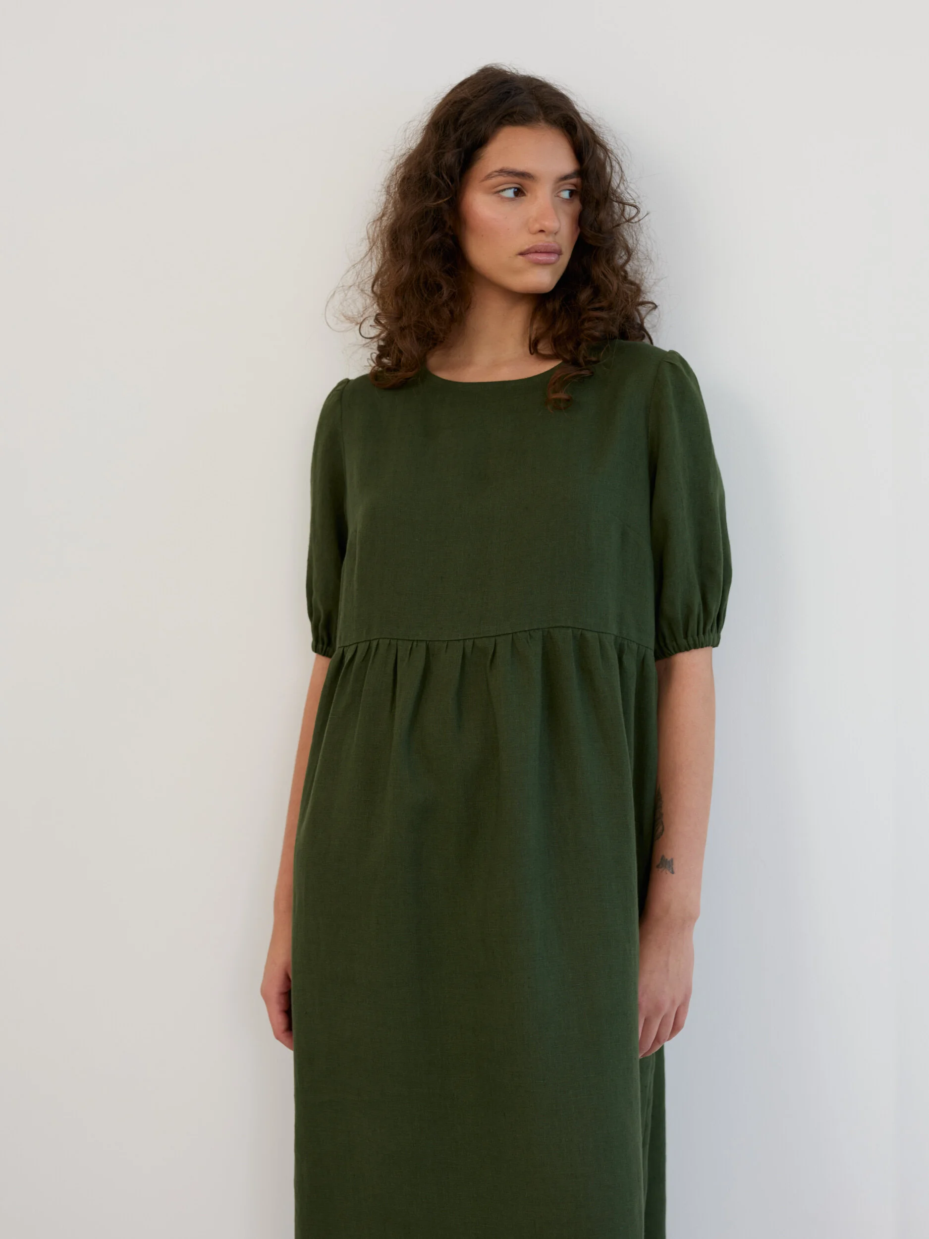 Image 1 of Linen Puff Sleeve Empire Waist Midi Dress in Forest Green ESME from Love and Confuse | Handmade Linen Clothing for Women