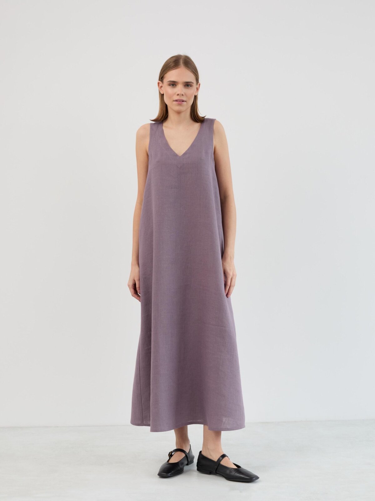 Front view of the Lanav linen maxi dress in lavender violet, full-length sleeveless silhouette with V neck and A-line flare to the ankle