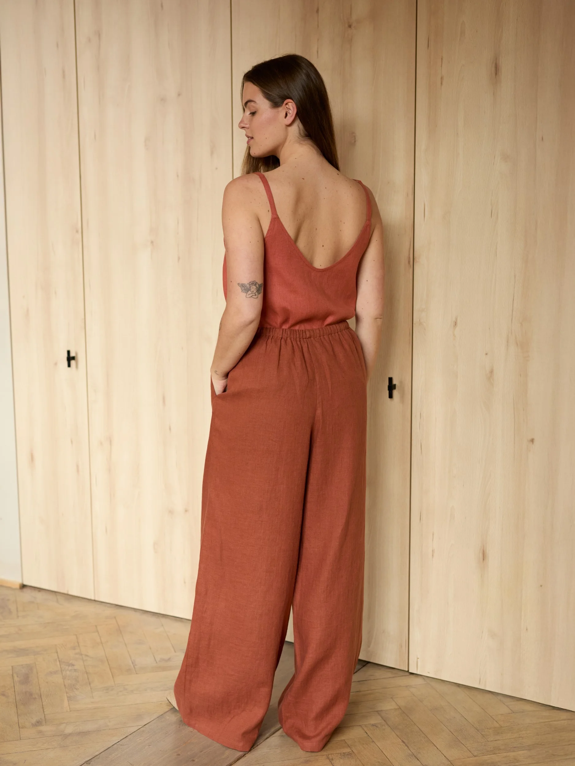 Image 6 of LUCAS wide-leg linen pants in Rust, featuring a drawstring waist and relaxed fit, from Love and Confuse.